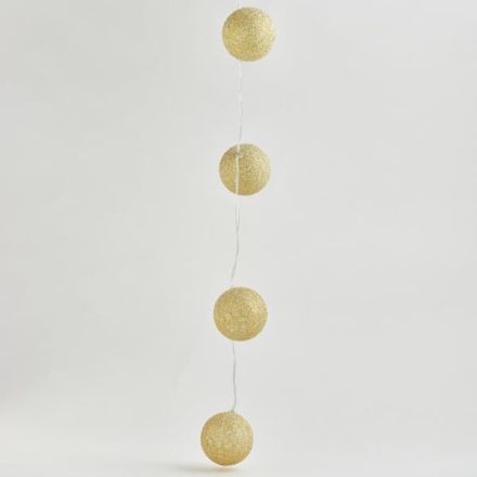 ΣΕΙΡΑ, 10 LED 5mm, ΧΡΥΣΕΣ ΥΦΑΣΜΑΤΙΝΕΣ ΜΠΑΛΕΣ 6cm,  ΜΠΑΤΑΡΙΑΣ 2xAA, ΧΡΟΝΟΔΙΑΚΟΠΤΗ, ΔΙΑΦΑΝΟ PVC ΚΑΛΩΔΙΟ, ΘΕΡΜΟ ΛΕΥΚΟ ΑΝΑ 15cm, ΠΡΟΕΚΤΑΣΗ ΠΑΡΟΧΗΣ 30cm, IP20