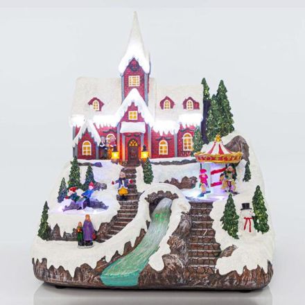 CHRISTMAS VILLAGE, WITH CAROUSSEL, MUSIC AND MOVEMENT, 33x38x44cm