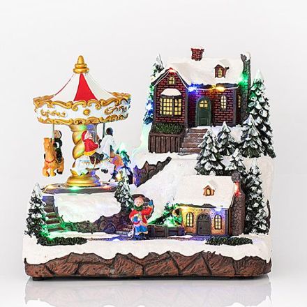 CHRISTMAS VILLAGE WITH CAROUSSEL, 24 LED, WITH TRANSFORMER, WITH MUSIC AND MOVEMENT,  22,5x15,5x20,5cm