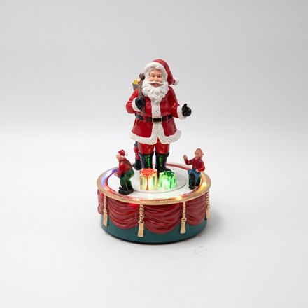 SANTA CLAUS ON A ROTATING BASE, BATERRY OPERATED, 13x13x19cm